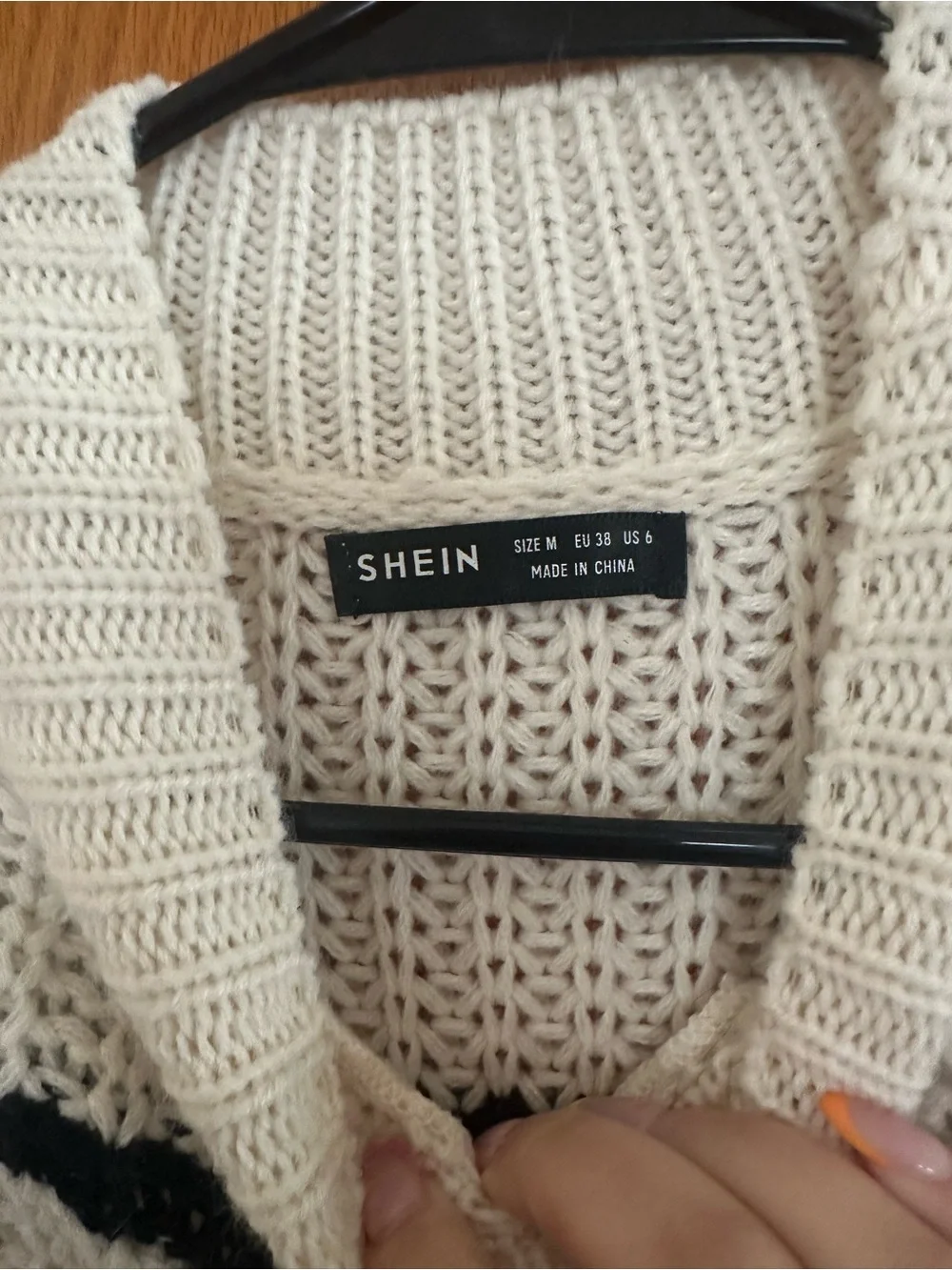 White and black striped sweater